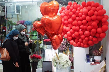 Women shop at a florist selling products for Valentine's Day in Riyadh, Saudi Arabia February 13, 2021. (File photo: Reuters)