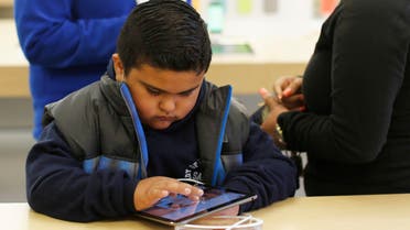 A child uses an ipad. (File photo: Reuters)