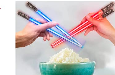 A photo of chopsticks that look light Star Wars light sabers. (Amazon)
