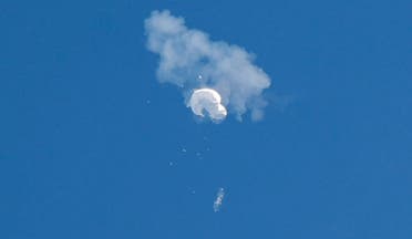 The suspected Chinese spy balloon drifts to the ocean after being shot down off the coast in Surfside Beach, South Carolina, U.S. February 4, 2023. (Reuters)
