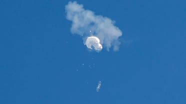 The suspected Chinese spy balloon drifts to the ocean after being shot down off the coast in Surfside Beach, South Carolina, U.S. February 4, 2023. (Reuters)