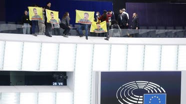 Supporters of Abdullah Ocalan, the leader of the Kurdistan Worker's Party (PKK), demonstrate during a plenary session at the European Parliament in Strasbourg, eastern France, on February 15, 2023. (AFP)