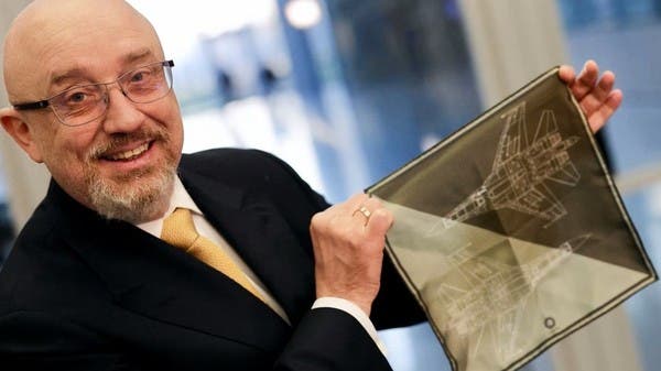 A strange scene.. The Ukrainian Defense Minister waving a handkerchief during NATO meetings