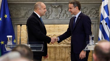 Greek Prime Minister Kyriakos Mitsotakis shakes hands with Bulgarian President Rumen Radev as they hold a news conference at the Maximos Mansion in Athens, Greece, February 16, 2023. (Reuters)