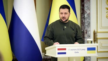 This handout picture taken and released by Ukrainian President press-service on February 17, 2023, shows Ukrainian President Volodymyr Zelenskyy speaking during a joint press conference with Prime Minister of the Netherlands in Kyiv. (AFP)