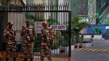 Members of the Indo-Tibetan Border Police (ITBP) stand guard outside a building housing BBC offices, where income tax officials are conducting a search for a second day, in New Delhi, India, February 15, 2023. (Reuters)