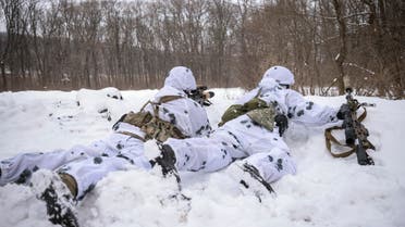 Ukrainian snipers hold weapons at their positions, as Russia's attack on Ukraine continues, in the front line city of Bakhmut, Ukraine February 17, 2023. (Reuters)