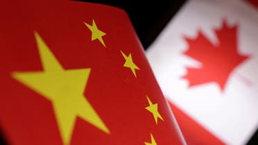 Printed Chinese and Canada flags are seen in this illustration, July 21, 2022. (Reuters)