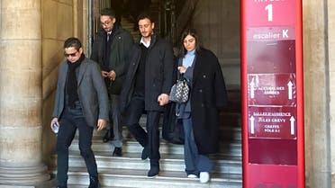 Moroccan singer Saad Lamjarred, second right, leaves the court house Monday, Feb. 20, 2023 in Paris. (AP)
