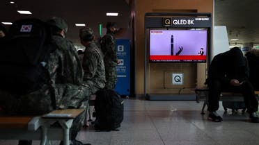 South Korean soldiers watch a TV broadcasting a news report on North Korea firing two ballistic missiles off its east coast, in Seoul, South Korea, February 20, 2023. REUTERS/Kim Hong-Ji
