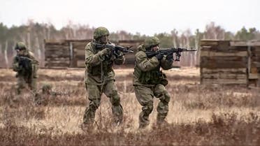 In this photo taken from video provided by the Russian Defense Ministry Press Service on Monday, Feb. 14, 2022, soldiers practice at the Obuz-Lesnovsky training ground during the Union Courage-2022 Russia-Belarus military drills in Belarus. (Russian Defense Ministry Press Service via AP)