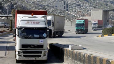 A convoy of trucks carrying aid from UN World Food Programme (WFP), following a deadly earthquake, enters Bab al-Hawa crossing, Syria, on February 20, 2023. (Reuters)