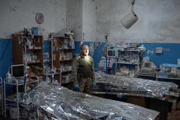 Viktor, a surgeon in a frontline medical stabilisation point, poses for a picture inside the operation room where medics treat war wounds, amid Russia's attack on Ukraine, near Vuhledar, Donetsk region, Ukraine, February 19, 2023. Describing the feeling of being unable to save a life, Viktor, a gynaecologist before the war, said: It's the worst thing you can imagine. (Reuters)
