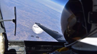 In this handout image provided by the Department of Defense, a US Air Force U-2 pilot looks down at the suspected Chinese surveillance balloon on February 3, 2023 as it hovers over the Central Continental United States. (US Department of Defense via Getty Images/AFP)