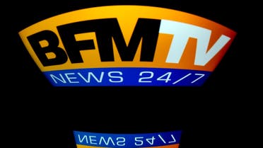  In this file photo taken on December 29, 2012 the French television channel BFMTV logo, is displayed on a tablet screen, in Paris. (AFP)