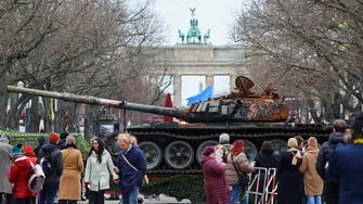 German activists park destroyed, rusting tank outside Russian embassy