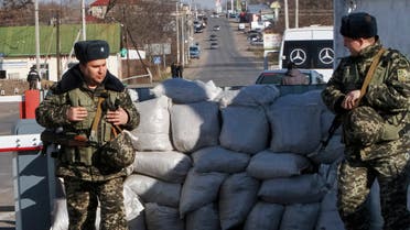 Ukrainian border guards stand at a checkpoint at the border with Moldova breakaway Transnistria region, near Odessa March 13, 2014. (File photo: Reuters)