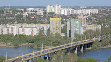 Cars and trucks are stuck in a traffic jam as they cross a bridge over the Dniester River toward the town of Rybnitsa in the breakaway region of Transdniestria, in this picture taken from Rezina, Moldova, on May 5, 2022. (Reuters)