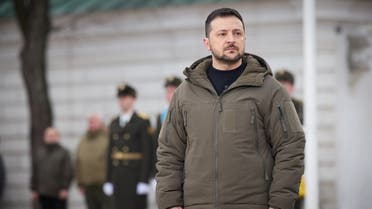 This handout picture taken and released by the Ukrainian presidential press service on February 24, 2023, shows the Ukrainian President Volodymyr Zelenskyy standing during a ceremony at St Sophia Square in Kyiv, on the first anniversary of the Russian invasion of Ukraine. (Ukrainian presidential press service via AFP)