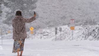 US storm: Snow, rain slam California as Michigan suffers without power
