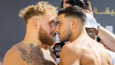 Jake Paul and Tommy Fury face off during weigh-ins on Saturday. (Supplied)