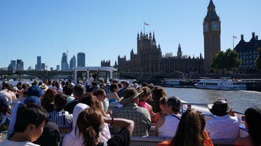 Tourists and visitors take a riverside cruise on River Thames, with the Elizabeth Tower, more commonly known as Big Ben, in the background, as the hot weather continues, in London, Britain August 10, 2022. (Reuters)