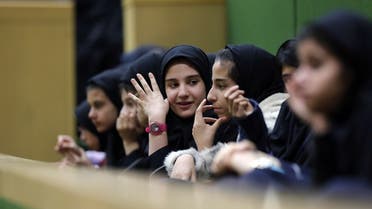 Iranian schoolgirls attend former President Hassan Rouhani’s presentation of the for 2018-2019 budget to the parliament on December 10, 2017, in Tehran. (AFP)