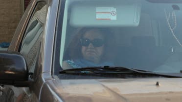 Lebanese Judge Ghada Aoun, sits in a car as she leaves the house belonging to central bank Governor Riad Salameh, in Rabieh, Lebanon June 22, 2022. (File photo: Reuters)