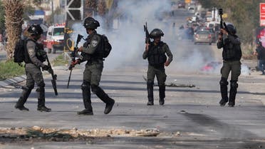 Israeli security forces clash with Palestinian youths during a military raid in the city of Jericho in the occupied West Bank on March 1, 2023. (AFP)