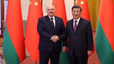 Belarusian President Alexander Lukashenko shakes hands with Chinese President Xi Jinping during a meeting in Beijing, China, on March 1, 2023. (Reuters)