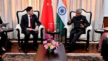 Chinese Foreign Minister Qin Gang speaks with his Indian counterpart Subrahmanyam Jaishankar during their meeting on the sidelines of G20 foreign ministers' meeting in New Delhi, India, March 2, 2023. (Reuters)