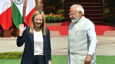 India’s Prime Minister Narendra Modi (R) and his Italian counterpart Giorgia Meloni pose before their meeting at the Hyderabad House in New Delhi on March 2, 2023. (AFP)