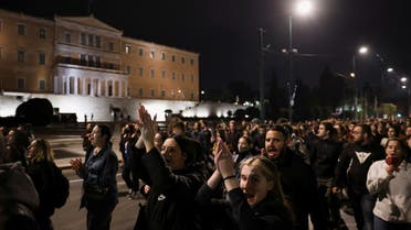 Protesters take part in a demonstration after a crash, where two trains collided near the city of Larissa, in front of the Greek parliament building, in Athens, Greece, March 1, 2023. (Reuters)