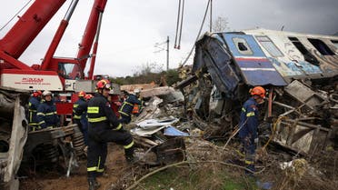 Rescuers operate on the site of a crash, where two trains collided, near the city of Larissa, Greece, March 1, 2023. REUTERS/Giannis Floulis