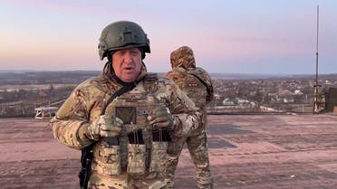 This video grab taken from a video posted on Telegram channel @concordgroup_official on March 3, 2023, shows Yevgeny Prigozhin, the chief of the Russian paramilitary group Wagner speaking to the camera from a rooftop at an undisclosed location. (AFP)