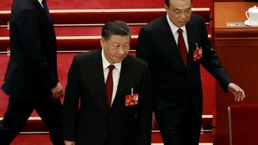 Chinese President Xi Jinping and Premier Li Keqiang arrive for the opening session of the National People's Congress (NPC) at the Great Hall of the People in Beijing, China March 5, 2023. (Reuters)