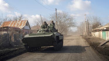 A Ukrainian APC drives towards frontline positions near Bakhmut, Ukraine, Saturday, March 4, 2023. (AP)