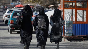 Afghan female students walk near Kabul University in Kabul, Afghanistan, December 21, 2022. (Reuters)