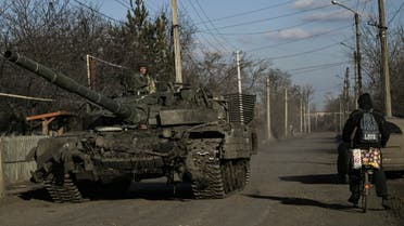Ukrainian servicemen drive a tank in the village of Chasiv Yar, near the city of Bakhmut in the region of Donbas on March 5, 2023, amid the Russian invasion of Ukraine. (Photo by Aris Messinis / AFP)