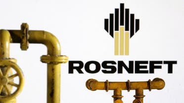 Model of natural gas pipeline and Rosneft logo, July 18, 2022. (Reuters)