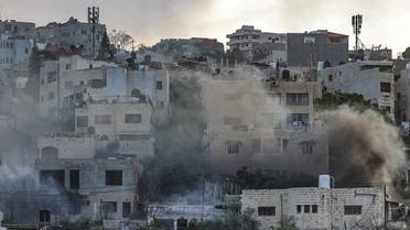 Smoke plumes billow during an Israeli army raid in the Jenin camp for Palestinian refugees in the occupied West Bank on March 7, 2023. (AFP)