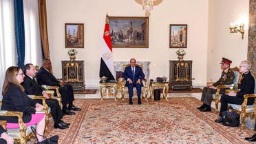 This handout picture released by the Egyptian Presidency shows Egypt's President Abdel Fattah al-Sisi (C) and Defence Minister Mohamed Zaki (2nd-R) meeting with US Defense Secretary Lloyd Austin (3rd-L) and his accompanying delegation at the presidential palace in Cairo on March 8, 2023. (AFP)