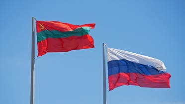 Flags of Moldova’s breakaway region of Transnistria and Russia flutter in central Tiraspol, in Moldova’s breakaway region of Transnistria on May 5, 2022. (Reuters)