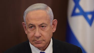 Israeli Prime Minister Benjamin Netanyahu heads the weekly cabinet meeting in his office in Jerusalem, on February 19, 2023. (AFP)