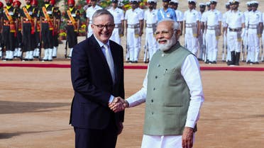 Australian Prime Minister Anthony Albanese shakes hands with his Indian counterpart Narendra Modi during his ceremonial reception at the forecourt of India's Rashtrapati Bhavan Presidential Palace in New Delhi, India, March 10, 2023. (Reuters)