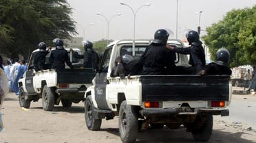 Police forces patrol the streets of Nouakchott, Mauritania, to disrupt a protest march planned by three leading opposition candidates two days ahead of the presidential election 05 November 2003. Police said the authorities had not been notified of the march -- called to protest at a police raid on the home of one of the candidates, Mohamed Khouna Ould Haidalah, and the subsequent arrest of his son -- and that it was not authorized. AFP PHOTO (Photo by GEORGES GOBET / AFP)