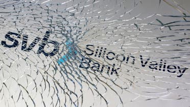 SVB (Silicon Valley Bank) logo is seen through broken glass in this illustration taken March 10, 2023. (Reuters)