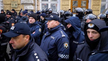 الشرطة المولدوفية خلال احتجاجات شهدتها البلاد (أ ب)