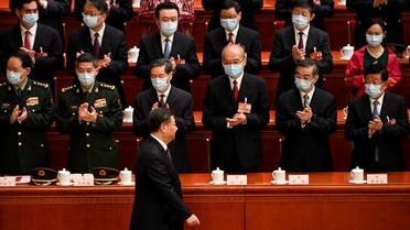 China's President Xi Jinping is applauded as he arrives for the fourth plenary session of the National People's Congress (NPC) at the Great Hall of the People in Beijing on March 11, 2023. GREG BAKER/Pool via REUTERS