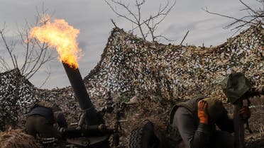 Ukrainian service members fire a mortar towards Russian troops outside the frontline town of Bakhmut, amid Russia's attack on Ukraine, in Donetsk region, Ukraine March 6, 2023. Supplied by Radio Free Europe. (Reuters).
